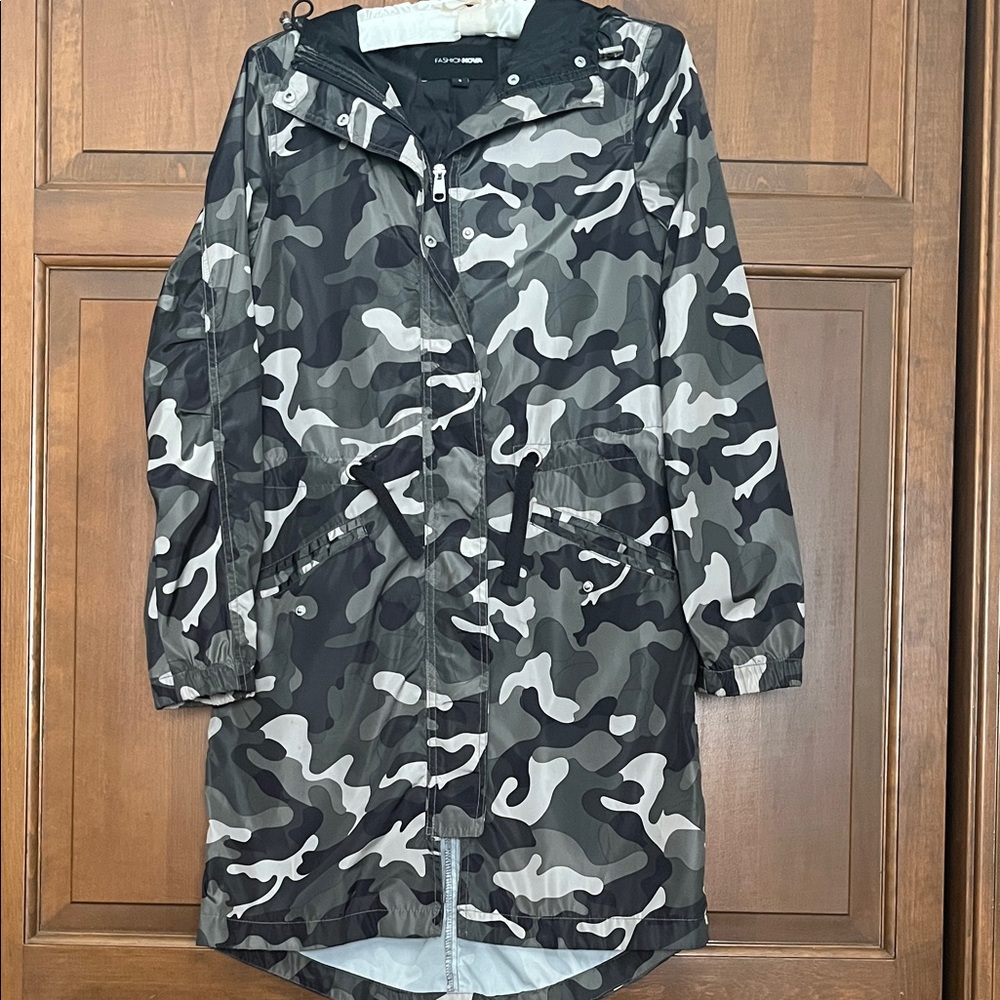 Green and black camo raincoat